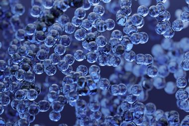 Glossy glass balls showing world under microscope