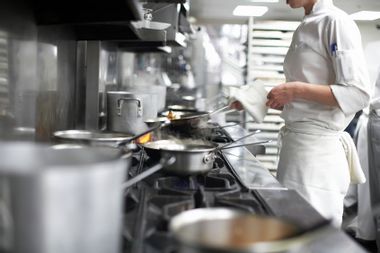 Chef cooking in commercial kitchen