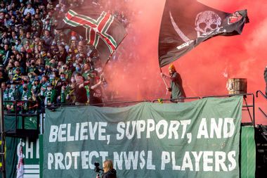 Portland Timbers fans set off red smoke in support of the NWSL womens soccer palyers as their ongoing protest over the sexual harrassment scandal