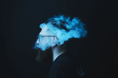 Smoke enveloping a man's head