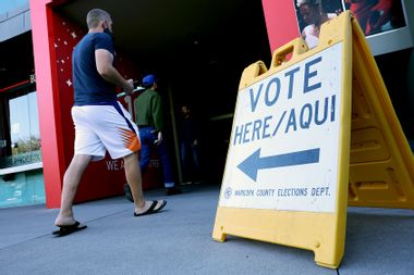 Voters arrive to cast their ballots at the Phoenix Art Museum on November 08, 2022 in Phoenix, Arizona.