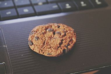 Chocolate Chip Cookie On Laptop