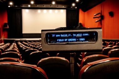 A closed-captioning device used by people with hearing impairment in a movie theater at North Shore Towers Cinema in Floral Park, New York on January 4, 2023