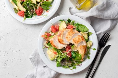 Grilled chicken salad with avocado, lettuce and grapefruit