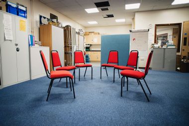 Rehabilitation centre room prepared for a group therapy session.