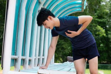 Young man suffering heart attack
