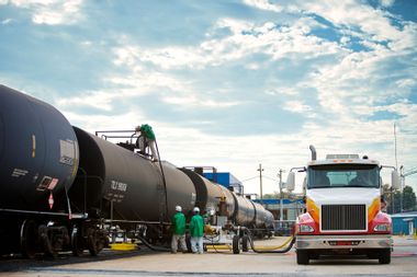 Workers Transferring Ethanol From Rail to Truck