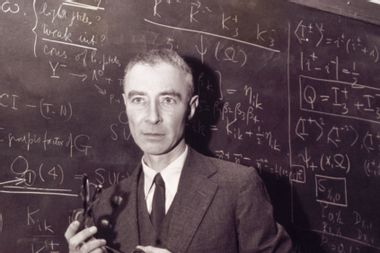 J Robert Oppenheimer Standing at Blackboard