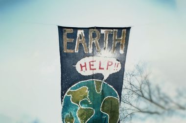 A banner at the inaugural Earth Day depicting the earth calling out for help, New York City, 22nd April 1970.