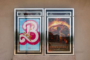 Movie posters for Barbie and Oppenheimer