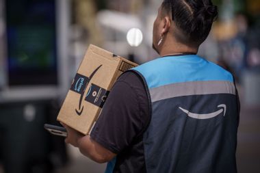 Amazon messenger delivers a package