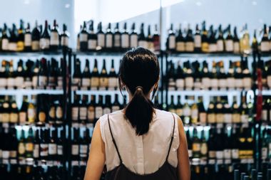 Woman shopping for wine