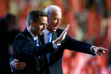Attorney General Beau and Vice Presidential candidate Senator Biden gesture on stage at the 2008 Democratic National Convention in Denver