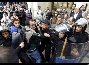 Image for Egyptian general quits meeting to tend crisis at home