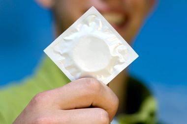teen with condom