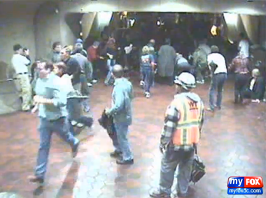 Image for Metro escalator fail causes horrifying multi-rider pileup after Colbert/Stewart Rally