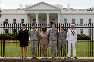 From left to right, Petty Officer Autumn Sandeen, Lt. Dan Choi, Cpl. Evelyn Thomas, Capt. Jim Pietrangelo II, Cadet Mara Boyd and Petty Officer Larry Whitt, handcuffed themselves to the fence outside the White House during a protest for gay-rights in Washington, Tuesday, April, 2010.