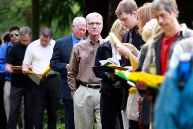 People wait in line at the 2011 Maximum Connections Job and Career Fair Thursday, Sept. 15, 2011, in Portland, Ore.