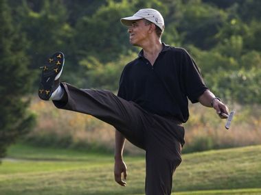 Image for Obama golfed with oil giants during climate rally