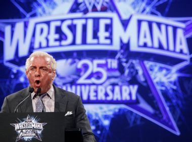 WWE Wrestler Ric "Nature Boy" Flair speaks during a press conference for the 25th Anniversary of WrestleMania in New York