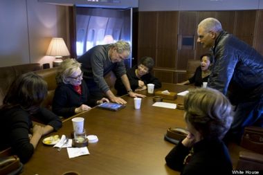 Image for Amazing photo features George W. Bush showing off his paintings to Hillary Clinton and others on Air Force One