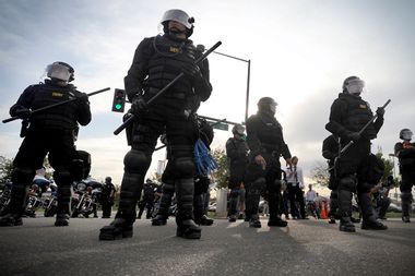Image for Police think we're the enemy: There will be more Fergusons if we keep militarizing local cops