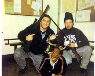 Image for Horrifying image shows disgraced Chicago police officers posing with black man wearing antlers