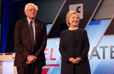 Democratic U.S. presidential candidates Senator Bernie Sanders and Hillary Clinton pose before the start of the Univision News and Washington Post Democratic U.S. presidential candidates debate in Kendall