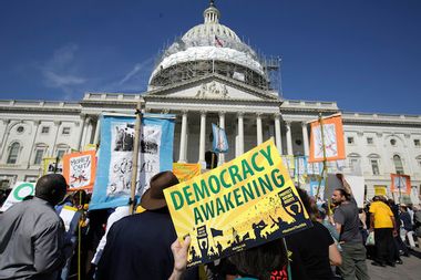 Pro-Democracy protesters rally in front of the U.S. Capitol in Washington