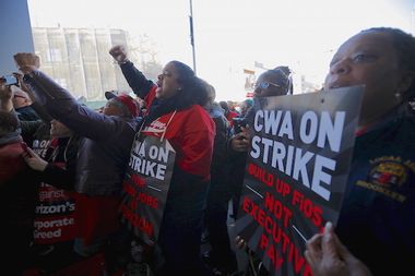 Communications Workers of America (CWA) workers striking against Verizon cheer as U.S. Democratic presidential candidate and U.S. Senator Bernie Sanders speaks to them in Brooklyn