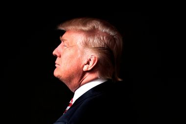 Republican U.S. presidential candidate Donald Trump poses for a photo after an interview with Reuters in his office in Trump Tower, in the Manhattan borough of New York City