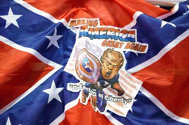 A Confederate flag with a depiction of Donald Trump
