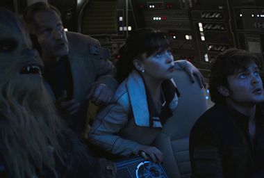 Woody Harrelson, Alden Ehrenreich, Emilia Clarke, and Joonas Suotamo in "Solo: A Star Wars Story"