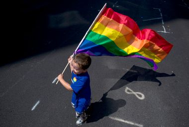 Child with Rainbow Flag