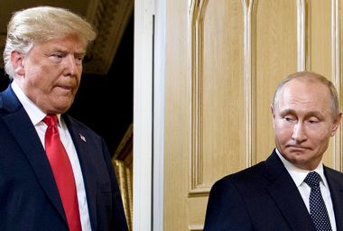 Donald Trump and Vladimir Putin arrive for a meeting in Helsinki, on July 16, 2018.