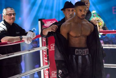 Sylvester Stallone as Rocky Balboa and Michael B. Jordan as Adonis Creed in "Creed II"