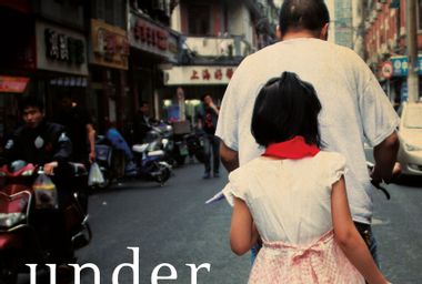 "Under Red Skies: Three Generations of Life, Loss, and Hope in China" by Karoline Kan
