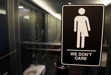 We Don't Care Bathroom Sign