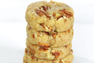 Image for Dress these pecan sandies up by drizzling melted chocolate over the top