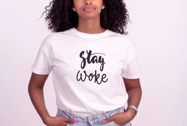 Woman in a "Stay Woke" shirt