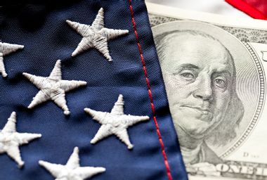 Close-up of Money and U.S. Flag