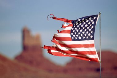 A tattered American flag