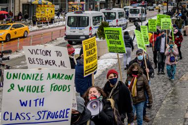Protesters outside a Jeff Bezos-owned Whole Foods store in New York City, an event in solidarity with unionizing Amazon workers in Bessemer, Alabama.