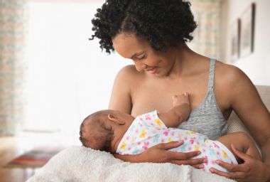 Mother breastfeeding baby