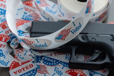 I Voted stickers with a handgun