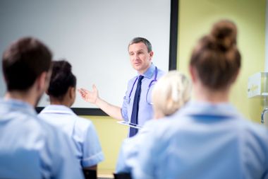 Doctor briefing medical students