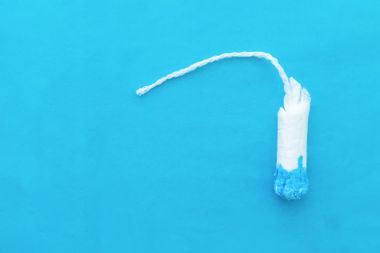 Women's tampon with blue on the end