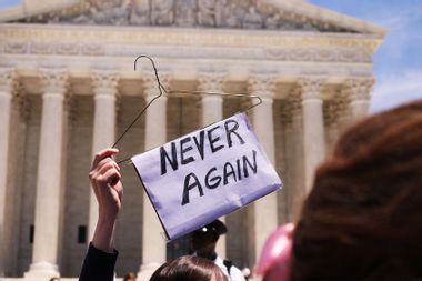 Pro-choice activists join a rally in support of women's rights in front of the US Supreme Court in Washington DC