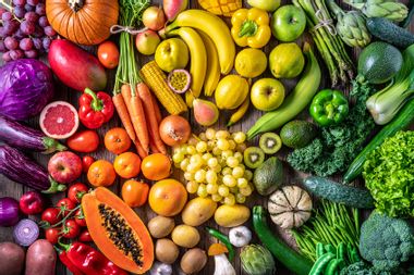 Colorful vegetables and fruits vegan food in rainbow colors