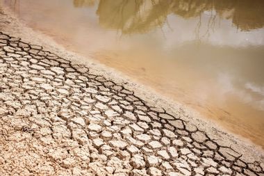 A dried out bank of a nearly water empty dam is pictured on a farm in Piket Bo-berg, Piketberg, north of Cape Town